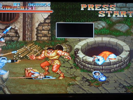 This controversial scene where a woman abandons her baby before throwing herself down a well was removed from the international arcade version of Warriors of Fate.